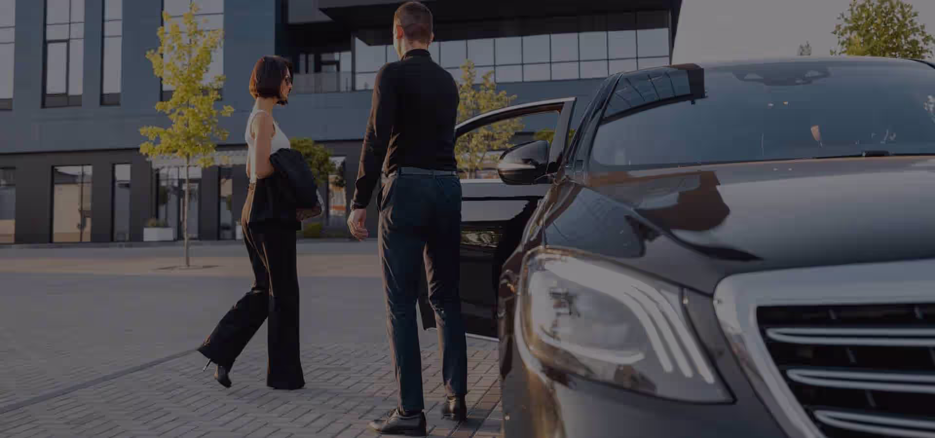 Professional limousine Chauffeur while picking up a corporate client in Boston MA to take her to Manchester VT for a visit