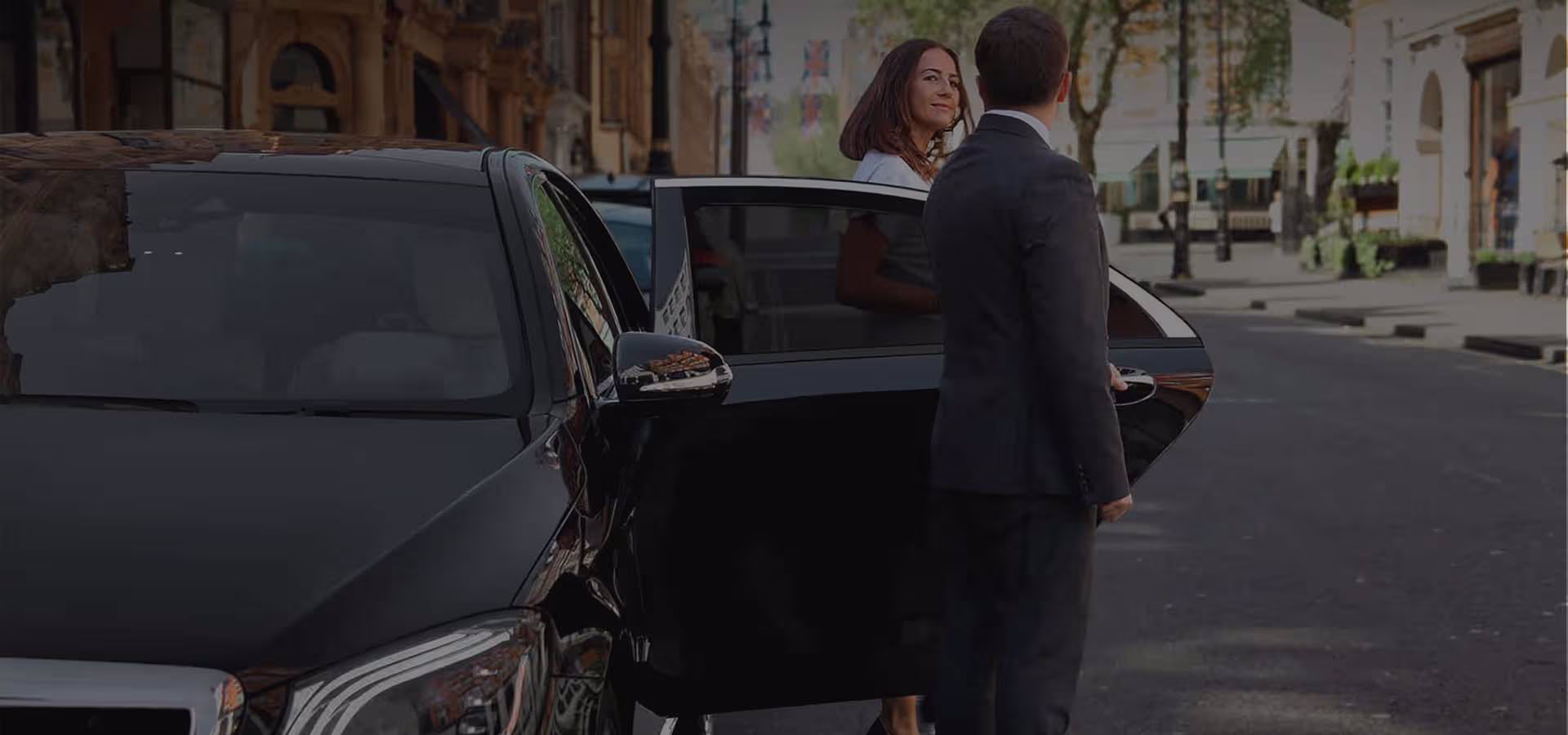 Chauffeured limo waiting outside the Ritz-Carlton Boston near Boston Common